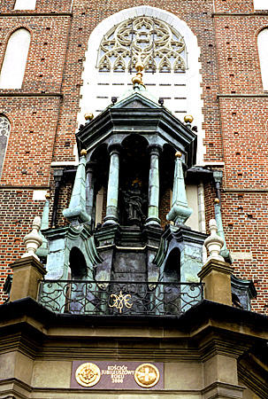 Detail over doorway of Church of St Mary on Market Square, Krakow. Poland.