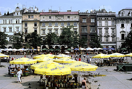 Flower market & buildings opposite Cloth Hall on Market Square in Krakow. Poland.