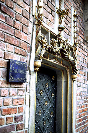 Library entrance door of Collegium Maius, where Copernicus taught, Krakow. Poland.