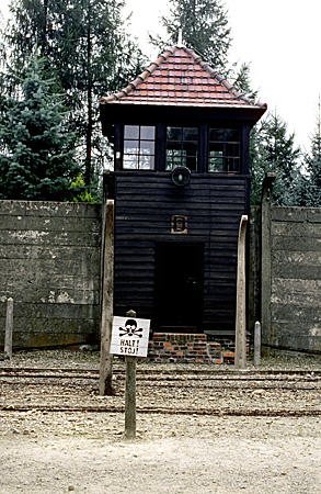 Guard tower & death zone in Auschwitz (Osweicim). Poland.