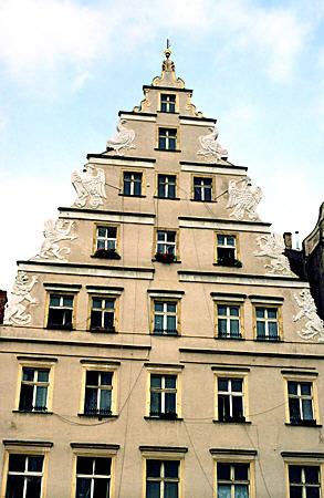 Building with lions, griffins, eagles, & birds on NW corner of Market Square in Wroclaw. Poland.