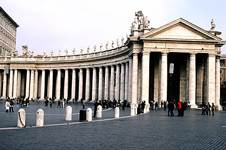 Curved colonnade arm of Bernini (1656) in front of St. Peter's Basilica. Vatican City.
