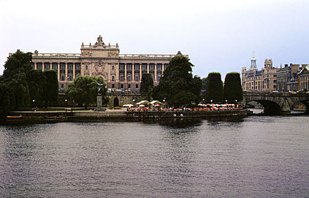 Parliament (Riksdag) with Royal Palace (Kungliga Slottet) in background, Stockholm. Sweden.