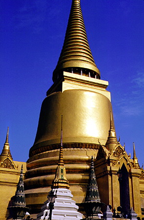 Temple of the Emerald Buddha (Phra Sri Ratana Chedi) tower in the Grand Palace, Bangkok. Thailand.