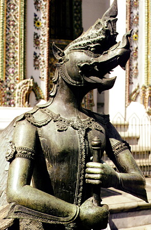 Statue guarding the entrance to one of the buildings of the Grand Palace in Bangkok. Thailand.