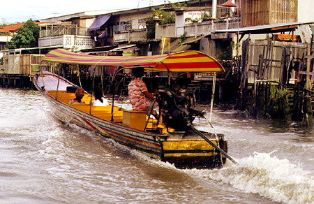 Riding on the khlongs (canals) of Bangkok. Thailand.