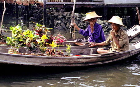 Floating flower market on the khlongs (canals) in Bangkok. Thailand.