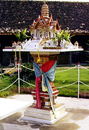 A shrine (Sala Chao) honoring a person who died and is now respected as a god at the railway station in Chiang Mai. Thailand.