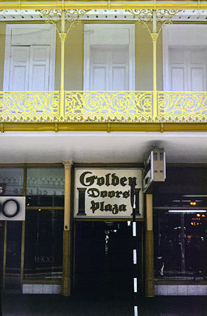 Shop on Frederick Street with ironwork balcony in Port of Spain. Trinidad and Tobago.