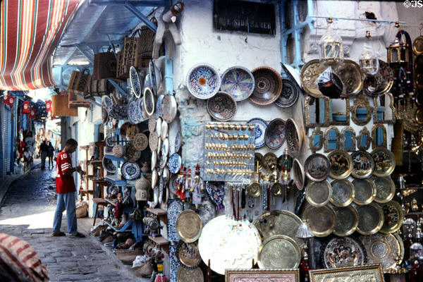 Ceramics & metal trays in shop in Medina. Tunis, Tunisia.