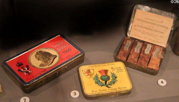 Gift tobacco & chocolate tins given to British troops during Boer War (c1900) at National War Museum of Scotland. Edinburgh, Scotland.