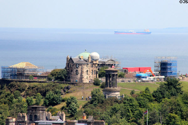 Calton Hill monuments including City Observatory (with domes) & round Dugald Stewart memorial. Edinburgh, Scotland.