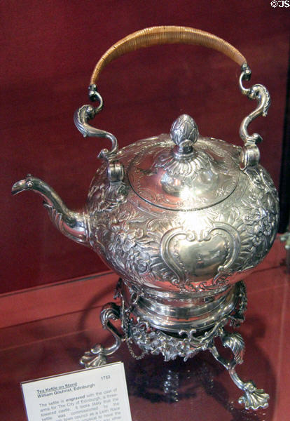 Silver tea kettle on stand engraved with city arms (1753) by William Gilchrist of Edinburgh at Museum of Edinburgh. Edinburgh, Scotland.