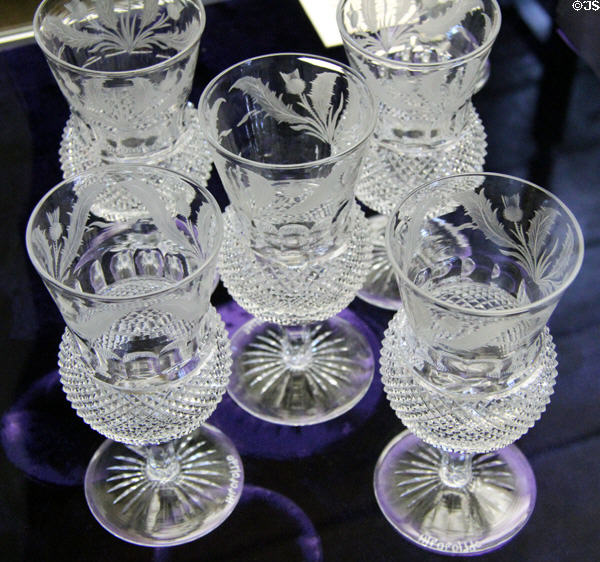 Send of glass goblets engraved with thistles at Museum of Edinburgh. Edinburgh, Scotland.