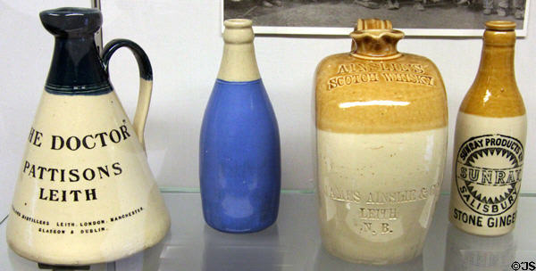Stoneware flagons & bottles (20thC) by A.W. Buchnan of Portobello, Scotland at Museum of Edinburgh. Edinburgh, Scotland.