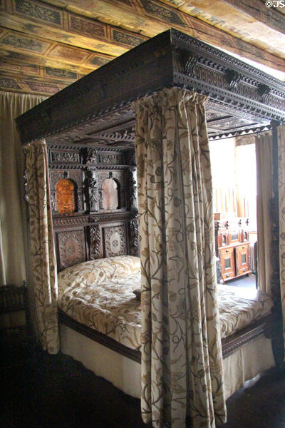 Four poster canopy bed (17thC) in painted chamber at Gladstone's Land tenement house. Edinburgh, Scotland.