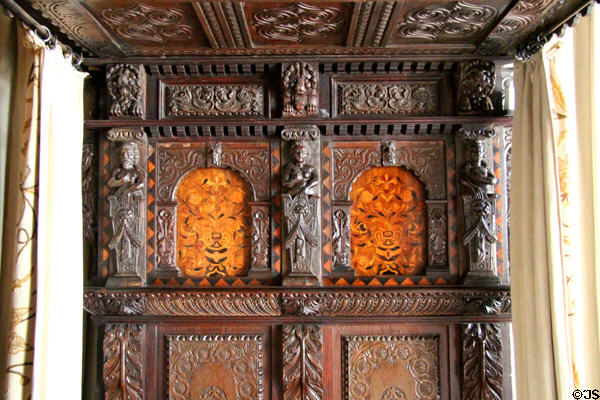 Carved headboard on canopy bed (17thC) in painted chamber at Gladstone's Land tenement house. Edinburgh, Scotland.