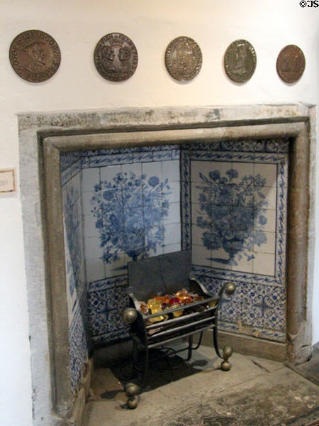 Fireplace with tiles by Bloempot Tile factory of Rotterdam at John Knox House. Edinburgh, Scotland.