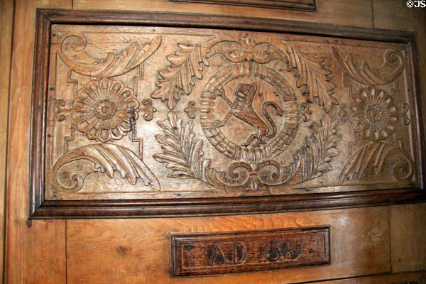 Carved oak panel with lion (1561) at John Knox House. Edinburgh, Scotland.