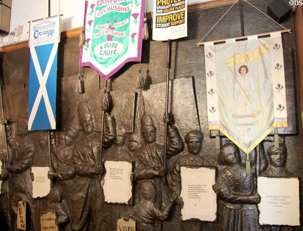 Sculpture holding banners of several Edinburgh political movements at People's Story Museum. Edinburgh, Scotland.