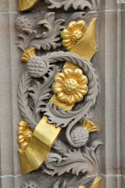 Entwined thistles & roses carved on surround of entrance doors at Queens Gallery. Edinburgh, Scotland.