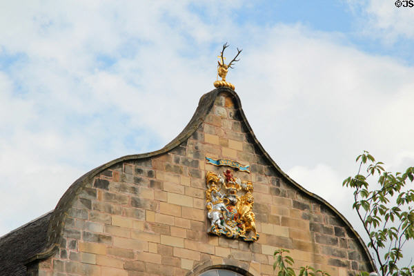 Crests on arched facade of Canongate Kirk. Edinburgh, Scotland.