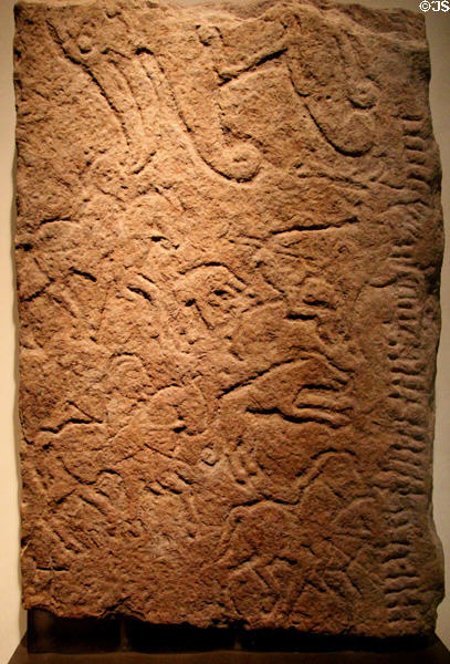 Deer hunt stone relief carving (c700-850) from Scoonie, Scotland at National Museum of Scotland. Edinburgh, Scotland.