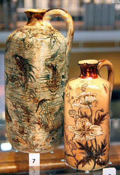 Stoneware vases incised with fish & poppies (1898) by Martin Brothers of Southall, London at National Museum of Scotland. Edinburgh, Scotland.