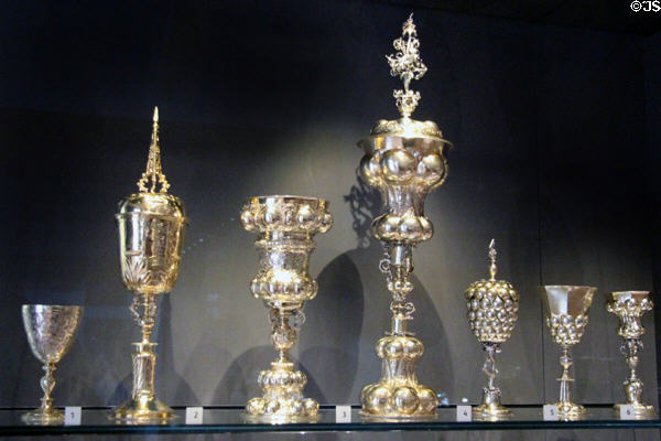 Gilt silver cups (1600-1640) from London (2 on left) & Germany (5 on right) at National Museum of Scotland. Edinburgh, Scotland.
