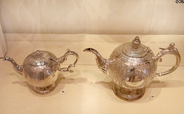 Silver teapots in revival of bullet shape (1857-8) by Walter Crichton & (1862-3) by G&M Crichton of Edinburgh at National Museum of Scotland. Edinburgh, Scotland.
