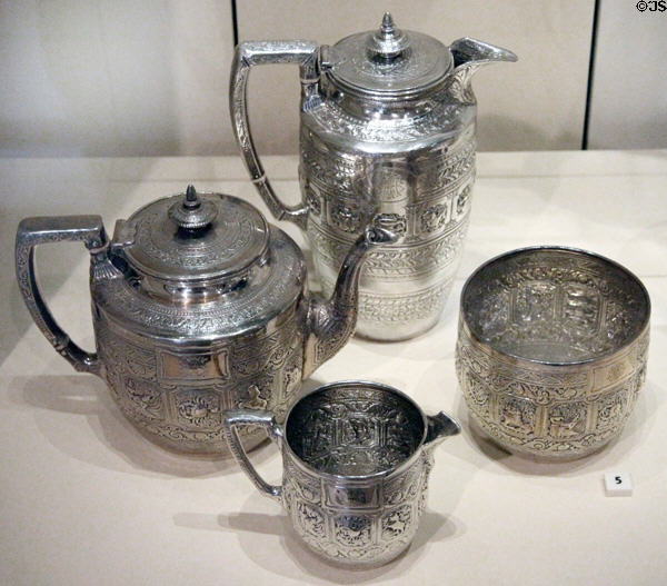 Silver tea set with signs of zodiac (1872-4) by J. Reid of Glasgow plus hot water jug added (1897-8) by W.W. Logan at National Museum of Scotland. Edinburgh, Scotland.