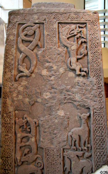 Pictish big stone cross carved with intertwined animals (c800-900) from Woodwray at National Museum of Scotland. Edinburgh, Scotland.