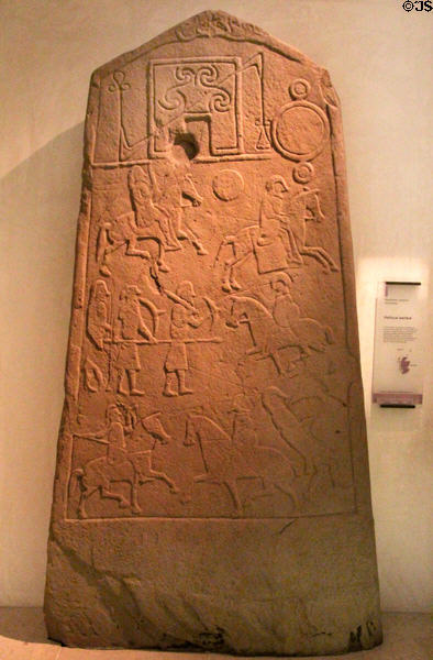 Modern copy of Pictish carving prob. Battle of Nechtansmere in 685 AD wherein Picts expelled Angle-Saxons with original found in Aberlemno at National Museum of Scotland. Edinburgh, Scotland.