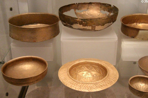 Roman bronze serving bowls & wine strainers from Helmsdale Hoard (200-400) at National Museum of Scotland. Edinburgh, Scotland.
