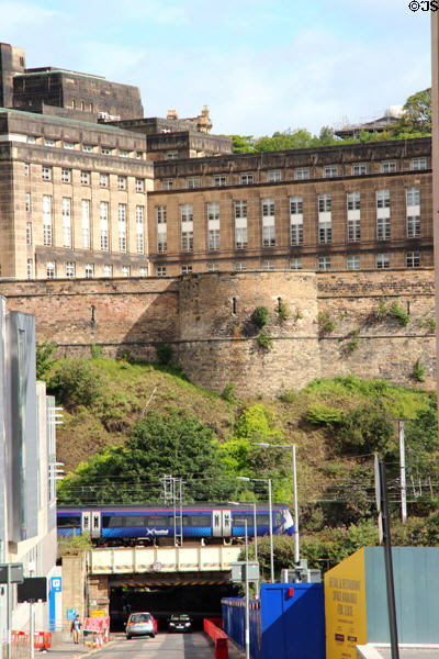 St Andrew's House government building above train leaving Waverley rail station. Edinburgh, Scotland.