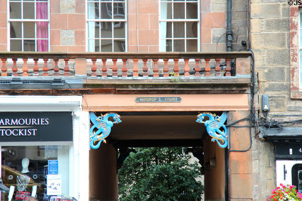Entrance to Wardrop's Court marked by two dragons on Royal Mile. Edinburgh, Scotland.