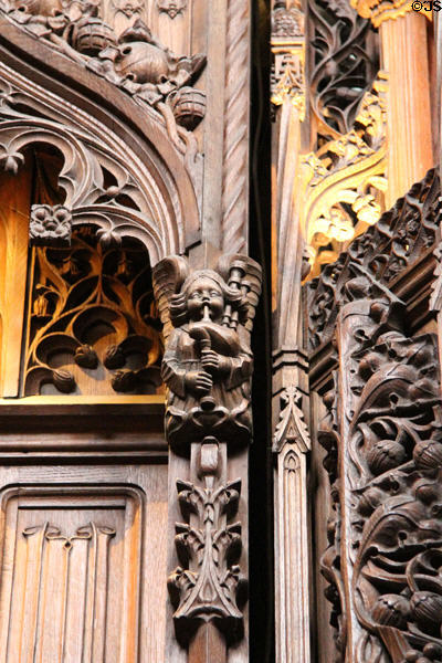 Carved bagpiper in Thistle Chapel at St Giles Cathedral. Edinburgh, Scotland.