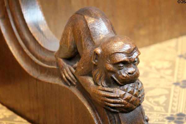 Carved monkey eating fruit in Thistle Chapel at St Giles Cathedral. Edinburgh, Scotland.