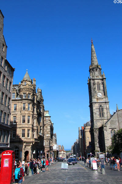 High St. with Scots Baronial tenement & Royal Mile Market (former Tron Kirk). Edinburgh, Scotland.