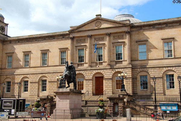 Duke of Wellington statue (1849-52) by David Bryce & James Gowans before Adam's General Register House (1774-88). Edinburgh, Scotland.