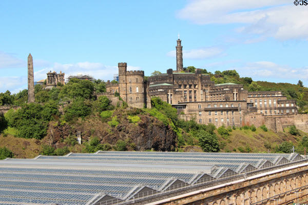 Monuments of Calton Hill over glass skylights of Waverly rail station. Edinburgh, Scotland.