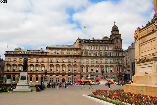 Italian Renaissance bank(1870) by J.T. Rochead; office building (1874) by James Sellars; & Merchants' House with tower (1878) by John Burnet (on west edge of George Square). Glasgow, Scotland.