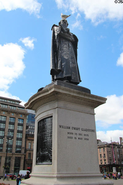 Bronze robed figure of Prime Minister William Ewart Gladstone (1902) by Hamo Thorneycroft (on George Square). Glasgow, Scotland.