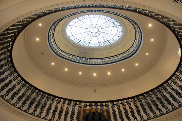 Decorative ironwork balustrade with leaded oval skylight above entrance area of Gallery of Modern Art. Glasgow, Scotland.