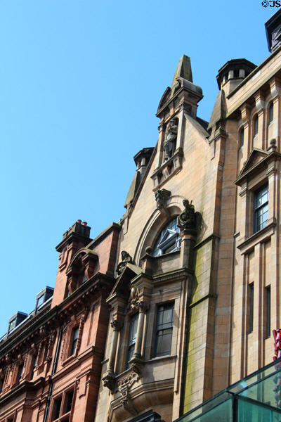 Heritage roofline with sculptures on Buchanan St. Mall. Glasgow, Scotland.