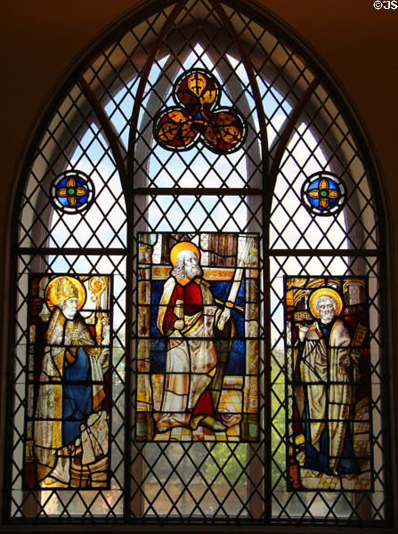 Stained glass window with three saints (Nicholas, Paul & Peter) at St Mungo's Museum. Glasgow, Scotland.