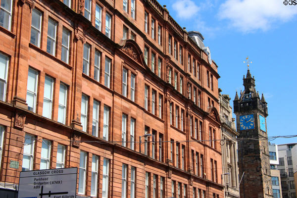 Former City Improvement Trust. Block (1903-12) & Glasgow's Tolbooth tower (1626-34). Glasgow, Scotland.