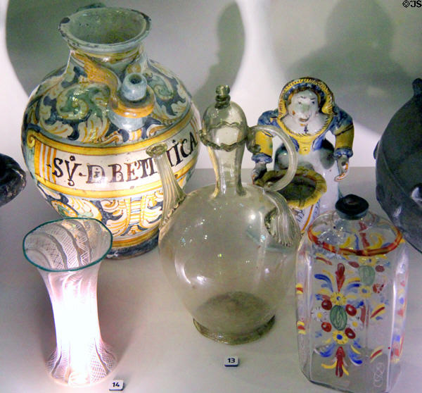 Glass Venetian-style latticino beaker(16-17thC), covered oil or vinegar burette from Spain (17thC) & painted glass sprit flask from Central Europe (18thC) at Hunterian Museum. Glasgow, Scotland.