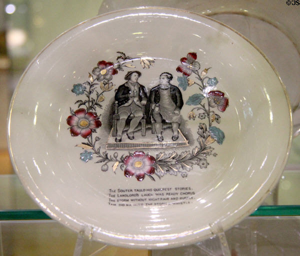 Tam O'Shanter & Souter Johnny plate commemorates Robert Burns story by unknown Scottish potter at Hunterian Museum. Glasgow, Scotland.