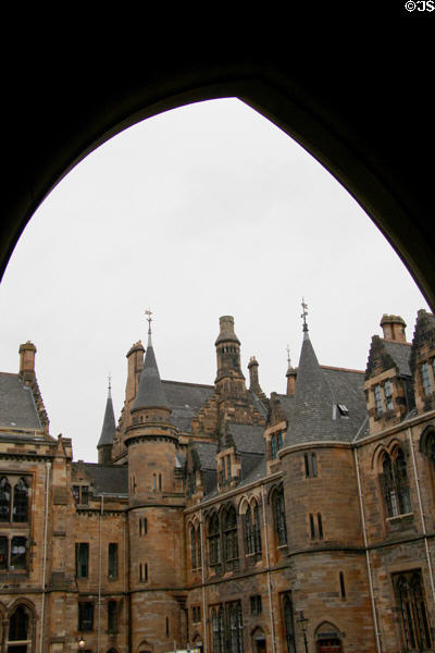 Gothic facade of Gilbert Scott Building (1870) courtyard at University of Glasgow. Glasgow, Scotland.